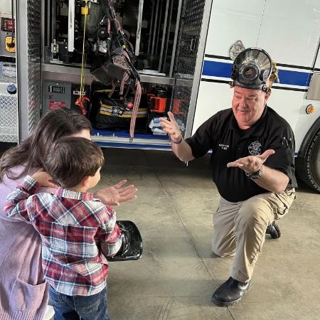 Firefighter kid and mom